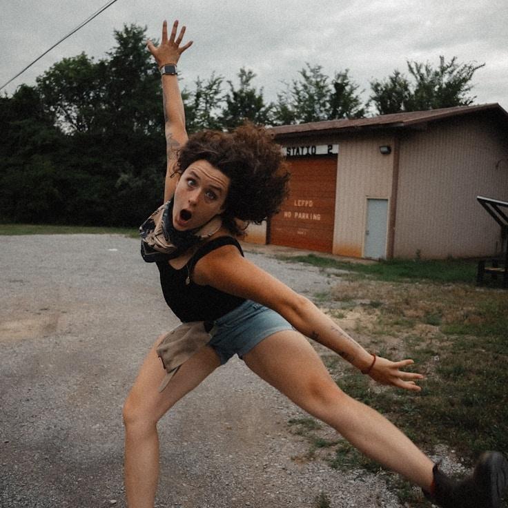 Alex Rivera, Senior Floral Designer at TimberQuillHaven, reviewing corporate floral arrangements